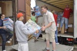 Program Robin Hood - 14 orphanages in Brno and surrounding area receive much needed brand name clothing, shoes & LEGO toys from Robin Hood team in cooperation with IVECO-STROJSERVIS in Horni Pocernice.